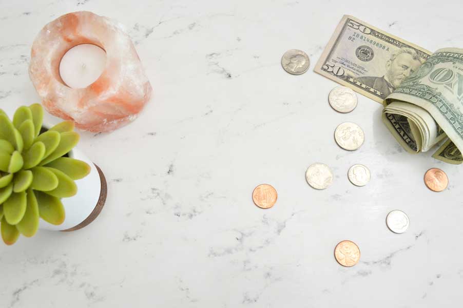 Cash and change on a counter top